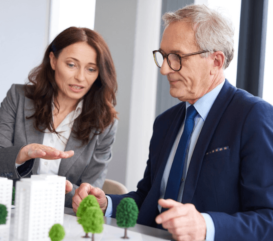 Property investors discussing a building development project